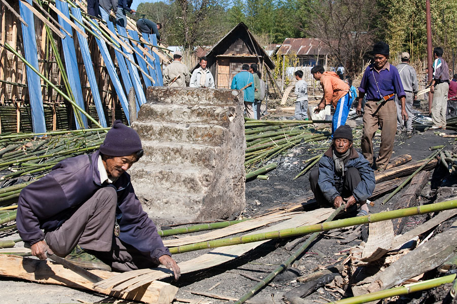  Rebuilding the bamboo houses after a big fire destroyed 15 of them